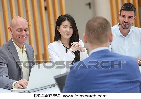 Stock Image - Business meeting. Fotosearch