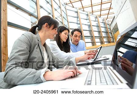 Stock Image - Business meeting. Fotosearch