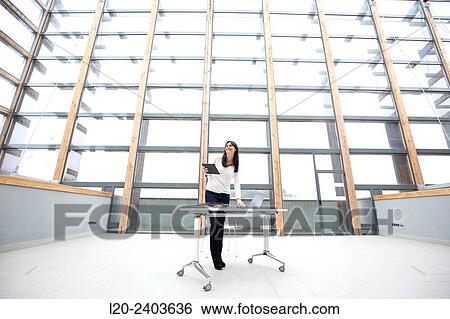 Business woman with digital tablet View Large Photo Image Stock Photograph - Business woman with digital tablet. Fotosearch