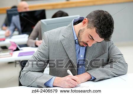 Businessman taking notes View Large Photo Image Stock Photo - Businessman taking notes. Fotosearch