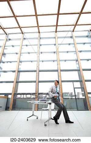 Businessman with digital tablet View Large Photo Image Stock Photo - Businessman with digital tablet. Fotosearch