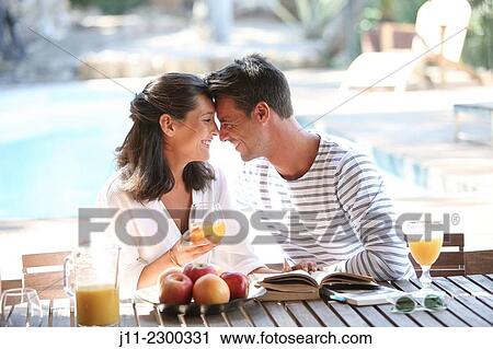 Stock Image - "Couple, breakfast". Fotosearch