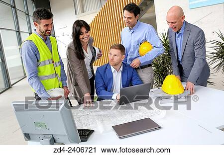 Engineers looking at map View Large Photo Image Stock Image - Engineers looking at map. Fotosearch