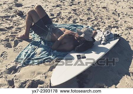 "Lazy surfer. Tarifa, Cadiz, Costa de la Luz, Andalusia, Spain. " View Large Photo Image Stock Photo - "Lazy surfer. Tarifa, Cadiz, Costa de la Luz, Andalusia, Spain. ". Fotosearch