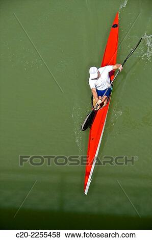 "Man canoeing on Guadalquivir river, Sevilla, Andalusia, Spain. " View Large Photo Image Stock Photo - "Man canoeing on Guadalquivir river, Sevilla, Andalusia, Spain. ". Fotosearch