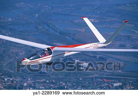 Stock Photo - "Old glider French plane Siren C-30s Edelweiss flying, France". Fotosearch
