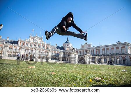 "Saltando frente al Palacio Real, Aranjuez. " View Large Photo Image Stock Photography - "Saltando frente al Palacio Real, Aranjuez. ". Fotosearch