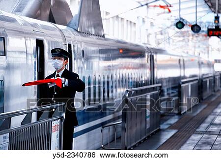 "Shinkansen departing from Okayama to Shin-Osaka, Japan. " View Large Photo Image Stock Photograph - "Shinkansen departing from Okayama to Shin-Osaka, Japan. ". Fotosearch