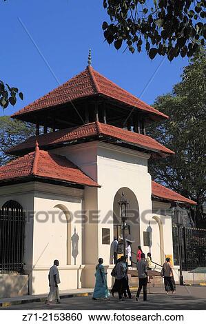Stock Image - "Sri Lanka; Kandy; Temple of the Tooth; entrance gate, people,.". Fotosearch