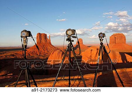 Stock Image - "USA, Arizona, Navajo reservation, Monument Valley tribal park, sunset on the red mesas". Fotosearch
