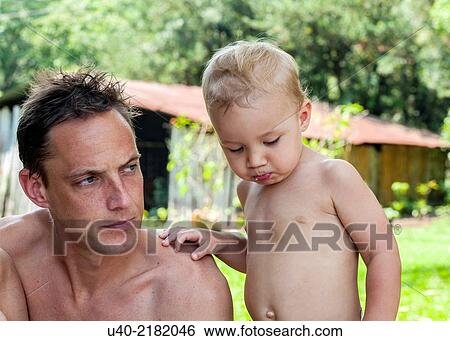 2 year old boy with his father. View Large Photo Image Stock Photograph - 2 year old boy with his father.. Fotosearch