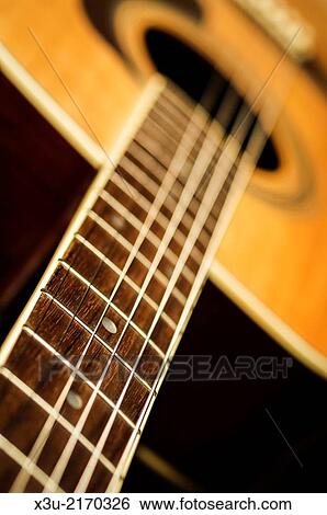 A close up of the fret board of a steel strung folk acoustic guitar. View Large Photo Image Stock Photograph - A close up of the fret board of a steel strung folk acoustic guitar.. Fotosearch