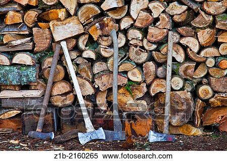 A stack of split logs for winter heating fuel. View Large Photo Image Stock Photography - A stack of split logs for winter heating fuel.. Fotosearch