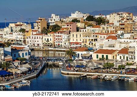 Stock Image - A View of The Town of Agios Nikolaos, Crete, Greek Islands, Greece.. Fotosearch
