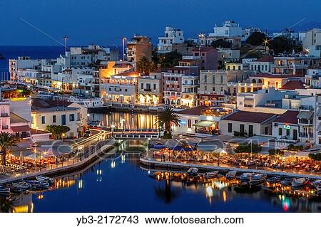 A View of The Town of Agios Nikolaos, Crete, Greek Islands, Greece. View Large Photo Image Stock Image - A View of The Town of Agios Nikolaos, Crete, Greek Islands, Greece.. Fotosearch