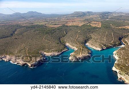 Stock Image - Aerial View of Cala Magraner and Cala Virgili, Mallorca, Balearic Island, Spain.. Fotosearch
