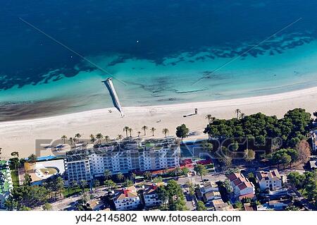 Aerial view of Pollença beach in winter, Mallorca, Balearic Island, Spain. View Large Photo Image Stock Image - Aerial view of Pollença beach in winter, Mallorca, Balearic Island, Spain.. Fotosearch