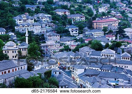 Albania, Gjirokastra, elevated town view from the castle, dusk. View Large Photo Image Picture - Albania, Gjirokastra, elevated town view from the castle, dusk.. Fotosearch