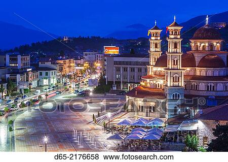 Albania, Korca, the Orthodox Cathedral, elevated view along the Boulevard Republika, dusk. View Large Photo Image Stock Photo - Albania, Korca, the Orthodox Cathedral, elevated view along the Boulevard Republika, dusk.. Fotosearch