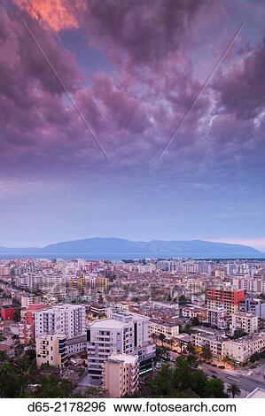 Albania, Vlora, elevated city view, dusk. View Large Photo Image Stock Photograph - Albania, Vlora, elevated city view, dusk.. Fotosearch