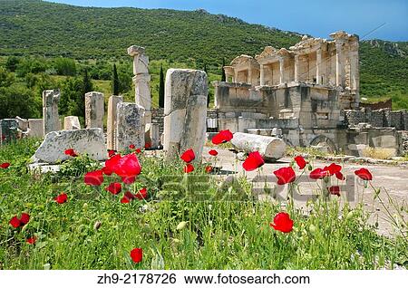 Stock Photograph - Antique city of Ephesus, poppy flowers in front, Turkey, Western Asia.. Fotosearch