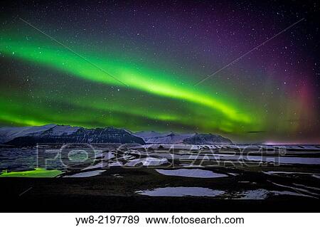 Aurora Borealis or Northern lights, Iceland. View Large Photo Image Stock Photo - Aurora Borealis or Northern lights, Iceland.. Fotosearch