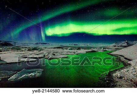 Auroras and Icebergs at the glacial lagoon, Jokulsarlon, Breidamerkurjokull, Vatnajokull Ice Cap, Iceland. View Large Photo Image Stock Image - Auroras and Icebergs at the glacial lagoon, Jokulsarlon, Breidamerkurjokull, Vatnajokull Ice Cap, Iceland.. Fotosearch