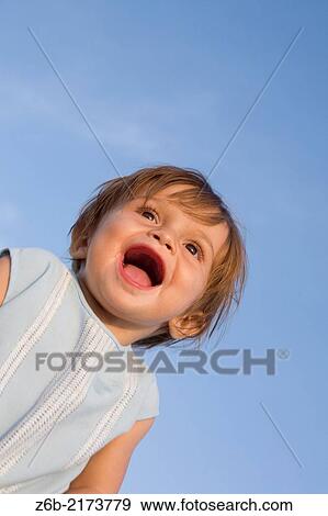 Baby girl, Outdoors, 11 months, Blue Sky, Laugth, Sunny, Joyful, Toothless, hemstitch View Large Photo Image Stock Photo - Baby girl, Outdoors, 11 months, Blue Sky, Laugth, Sunny, Joyful, Toothless, hemstitch. Fotosearch