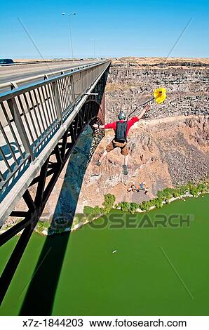 BASE jumping at the Perrine Memorial Bridge over the Snake River Canyon near the city of Twin Falls in southern Idaho View Large Photo Image Stock Image - BASE jumping at the Perrine Memorial Bridge over the Snake River Canyon near the city of Twin Falls in southern Idaho. Fotosearch