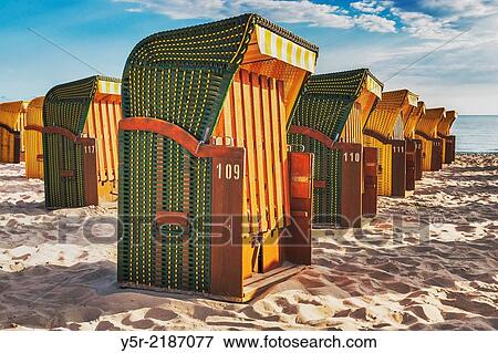 Beach chairs at the Baltic Sea beach, Baltic resort Binz, Ruegen Island, County Vorpommern-Ruegen, Mecklenburg-Western Pomerania, Germany, Europe. View Large Photo Image Stock Photo - Beach chairs at the Baltic Sea beach, Baltic resort Binz, Ruegen Island, County Vorpommern-Ruegen, Mecklenburg-Western Pomerania, Germany, Europe.. Fotosearch