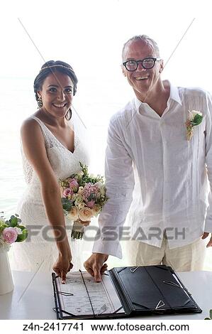 Beuautiful intercultural couple, wedding. View Large Photo Image Stock Image - Beuautiful intercultural couple, wedding.. Fotosearch