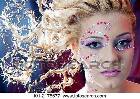 blond girl with fancy hairstyle and makeup. View Large Photo Image Stock Photo - blond girl with fancy hairstyle and makeup.. Fotosearch