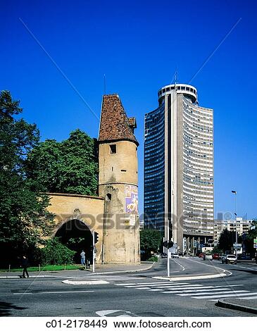 Stock Photo - Bollwerk gate 14th Century and Tour de lÂ´Europe tower Mulhouse Alsace France.. Fotosearch