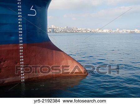 Bow of ship in Puerto de La Luz, Las Palmas with Las Palmas city in background. Gran Canaria, Canary Islands, Spain. View Large Photo Image Picture - Bow of ship in Puerto de La Luz, Las Palmas with Las Palmas city in background. Gran Canaria, Canary Islands, Spain.. Fotosearch