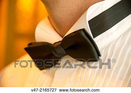 Stock Photo - Bow tie groom. Fotosearch