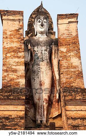 Buddha effigy at Wat Mahathat, Sukhothai Historical Park, Thailand. View Large Photo Image Picture - Buddha effigy at Wat Mahathat, Sukhothai Historical Park, Thailand.. Fotosearch