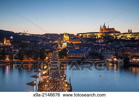 Charles Bridge and Castle illuminated at night, Prague, Czech Republic. View Large Photo Image Stock Photograph - Charles Bridge and Castle illuminated at night, Prague, Czech Republic.. Fotosearch