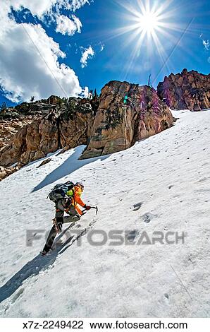 climbing the Chockstone Couloir, AKA the Boy Scout Couloir an alpine route which is rated Grade 3, Class 4 and located on The Grand Mogul in the Sawtooth Mountains in central Idaho. View Large Photo Image Stock Image - climbing the Chockstone Couloir, AKA the Boy Scout Couloir an alpine route which is rated Grade 3, Class 4 and located on The Grand Mogul in the Sawtooth Mountains in central Idaho.. Fotosearch