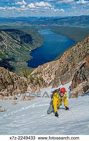 climbing the Chockstone Couloir, AKA the Boy Scout Couloir an alpine route which is rated Grade 3, Class 4 and located on The Grand Mogul in the Sawtooth Mountains in central Idaho. View Large Photo Image Stock Image - climbing the Chockstone Couloir, AKA the Boy Scout Couloir an alpine route which is rated Grade 3, Class 4 and located on The Grand Mogul in the Sawtooth Mountains in central Idaho.. Fotosearch
