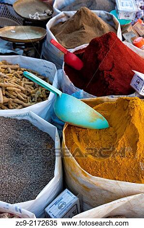 Colorful spicies at a streets stall in the market area of the ancient medina, Tiznit, Morocco. View Large Photo Image Stock Photography - Colorful spicies at a streets stall in the market area of the ancient medina, Tiznit, Morocco.. Fotosearch