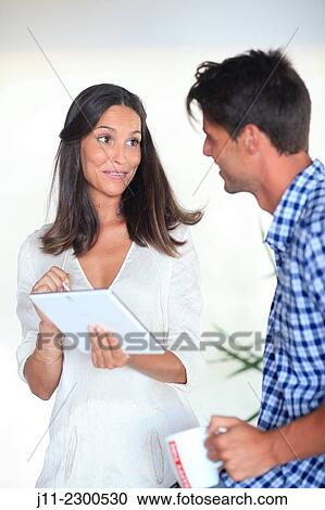 Couple with digital tablet View Large Photo Image Stock Image - Couple with digital tablet. Fotosearch