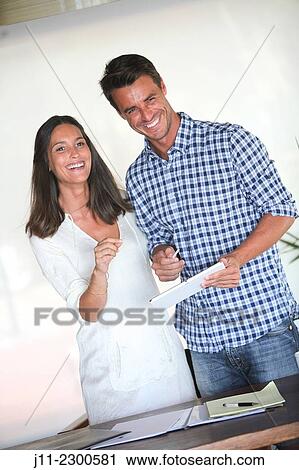 Couple with digital tablet View Large Photo Image Stock Image - Couple with digital tablet. Fotosearch