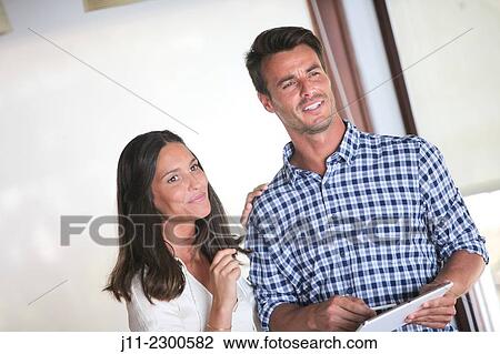 Couple with digital tablet View Large Photo Image Stock Image - Couple with digital tablet. Fotosearch