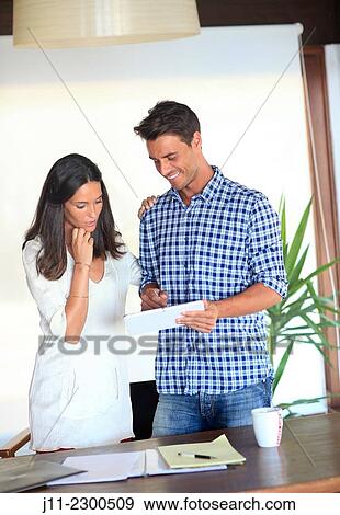 Couple with digital tablet View Large Photo Image Stock Photo - Couple with digital tablet. Fotosearch