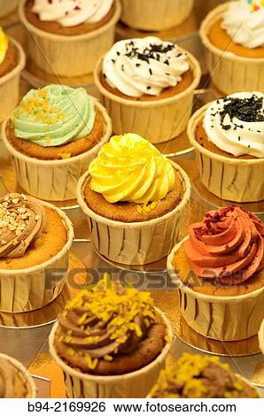 Stock Photograph - Cupcakes. Alimentaria, International Food and Drinks Exhibition, Fira de Barcelona. LÂ´Hospitalet de Llobregat, Barcelona, Catalonia, Spain.. Fotosearch