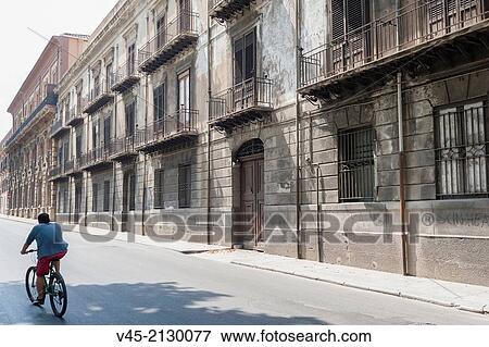 Cyclist at Via Vittorio Emanuele, Palermo, Sicily, Southern Italy, Italy. View Large Photo Image Stock Photo - Cyclist at Via Vittorio Emanuele, Palermo, Sicily, Southern Italy, Italy.. Fotosearch