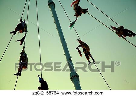 Picture - Daring men from Papantla Veracruz perform the Dance of the Flyers a ceremony which is classified as intangible cultural heritage by UNESCO, Cumbre TajÃ­n.. Fotosearch