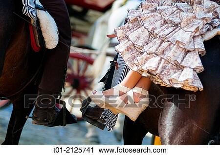 Stock Image - Detail or riders in the April Fair in Seville.. Fotosearch