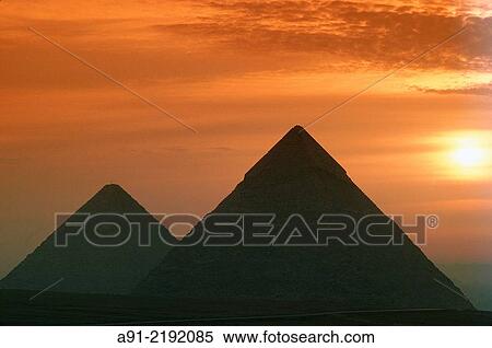 EGYPT. CAIRO. GIZEH. THE PYRAMIDS BACKLIGHTED AT SUNRISE. View Large Photo Image Stock Photography - EGYPT. CAIRO. GIZEH. THE PYRAMIDS BACKLIGHTED AT SUNRISE.. Fotosearch