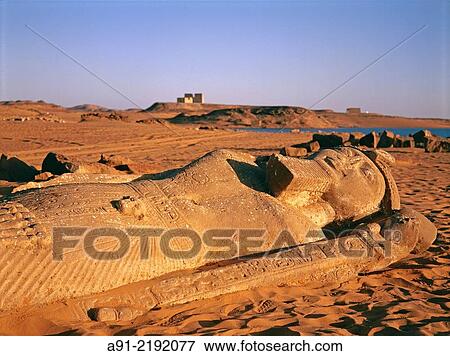 Egypt, lake nasr in nubia, Wadi El Sebia temple, fallen statue of pharaoh and king Ramasse II. View Large Photo Image Stock Photo - Egypt, lake nasr in nubia, Wadi El Sebia temple, fallen statue of pharaoh and king Ramasse II.. Fotosearch